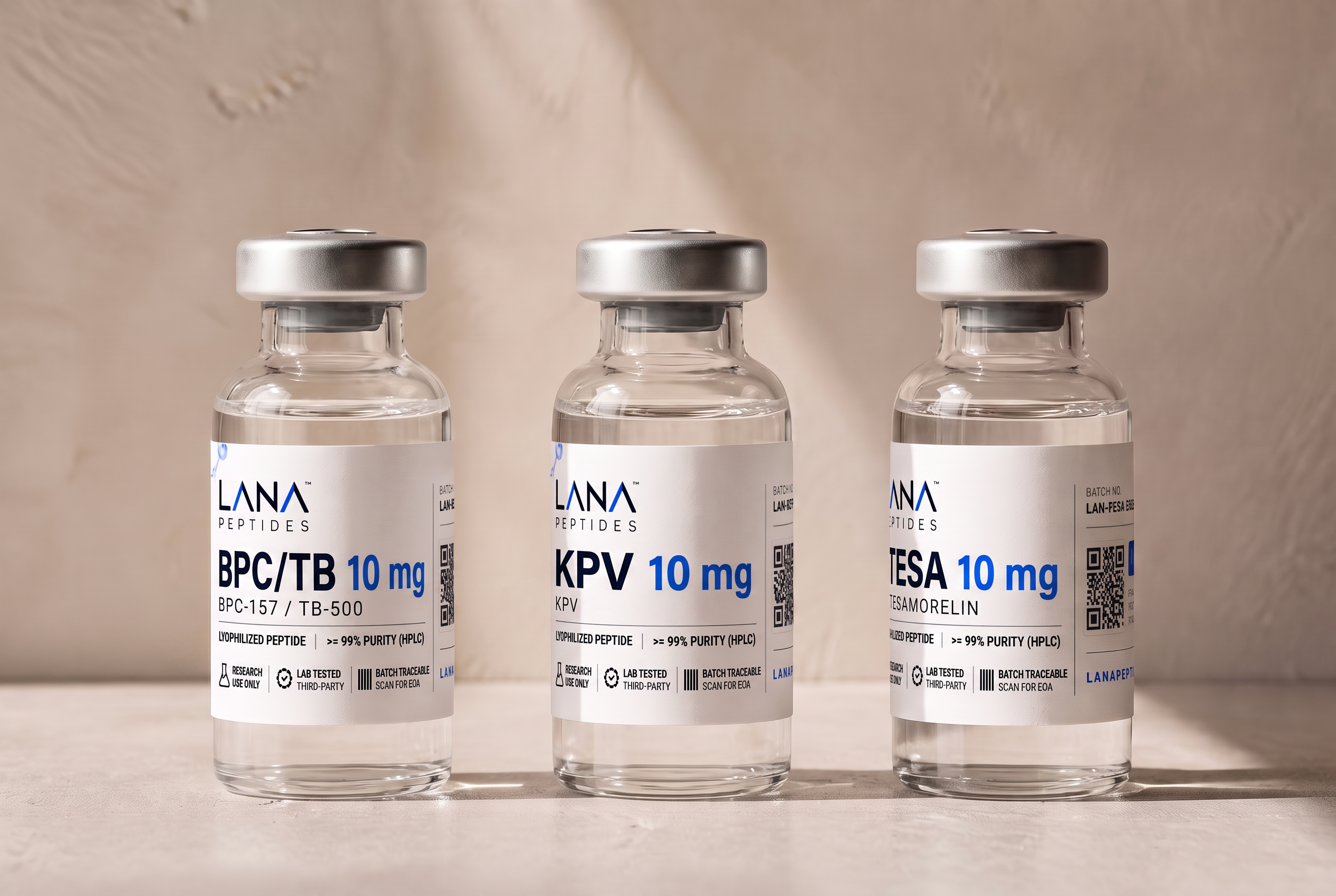 Clear glass research vials on a warm neutral surface in soft daylight